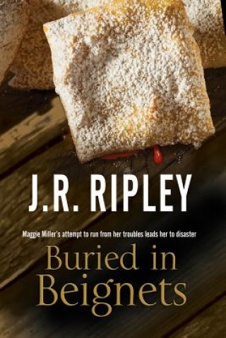 Книга Buried in Beignets J.R. Ripley